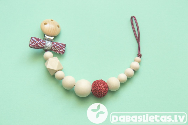 latvisks-knupisa-turetajs-koka-aptamborets-jaundzimusajam